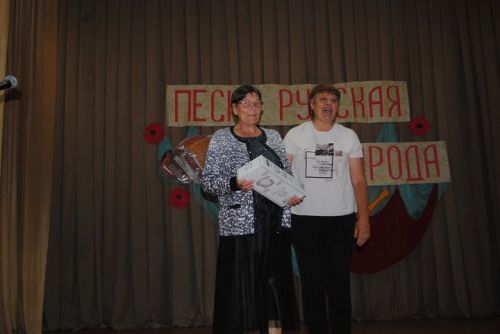 Трудом и песней славится село